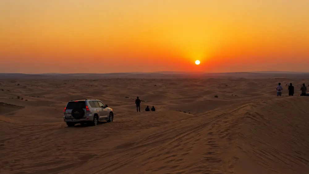 desert safari dubai sunset di atas bukit pasir